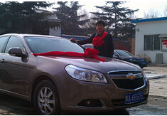 超前涂料獎勵員工轎車，真石漆生產(chǎn)廠家！